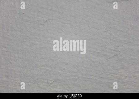 Mur de béton blanc grunge background. À partir de l'arrière-plan détaillé de haut mur de pierre de fragment. Banque D'Images