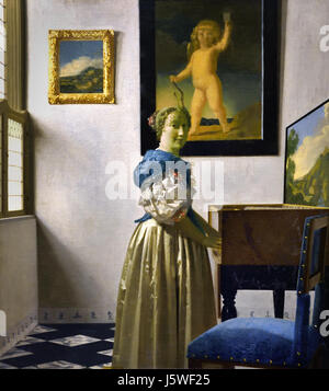 Une jeune femme debout à l'épinette 1670-2 Johannes Vermeer 1632 - 1675 Le Néerlandais Pays-Bas Banque D'Images