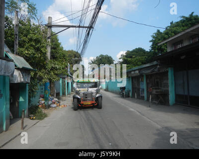 Une photographie de l'église SantÃ­sima Trinidad située à Pinagbakahan, Lugam, Malolos City, Bulacan. L'image met en évidence les caractéristiques architecturales de l'église et son rôle en tant que centre religieux local. Banque D'Images