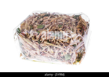 Les feuilles sèches de la citronnelle dans paquet. Studio Photo Banque D'Images