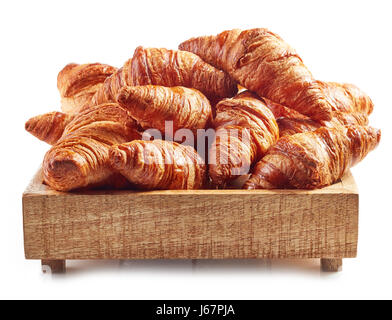 Des croissants frais, dans un coffret en bois Banque D'Images