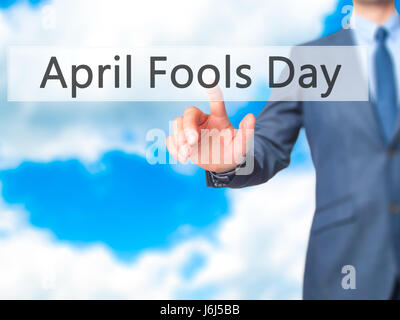 April Fools Day - Businessman appuyez sur sur écran numérique. Business, internet concept. Stock Photo Banque D'Images