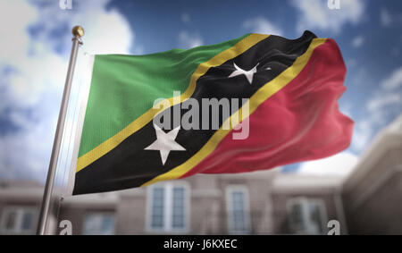 Saint Kitts-et-Nevis Flag 3D Rendering sur fond bleu Sky Building Banque D'Images