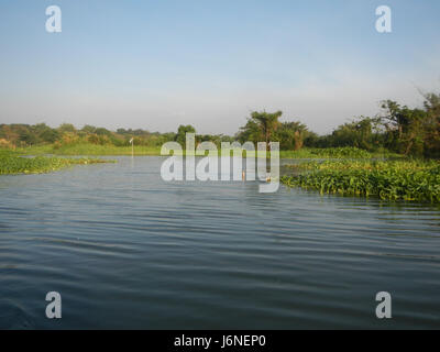 Ce titre fait probablement référence à une zone géographique située à Bulacan, aux Philippines, plus précisément le long des berges de la rivière Pulilan. Il comprend plusieurs endroits comme Dampol, Lumbac, Poblacion et Lumang Bayan dans la ville de Plaridel. La région est remarquable pour ses activités agricoles locales et fluviales. Banque D'Images