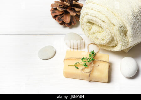 Massage or aromatherapy set: oil, stones and soap Banque D'Images