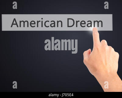 American Dream - part en appuyant sur un bouton sur l'arrière-plan flou concept . Le commerce, la technologie, internet concept. Stock Photo Banque D'Images