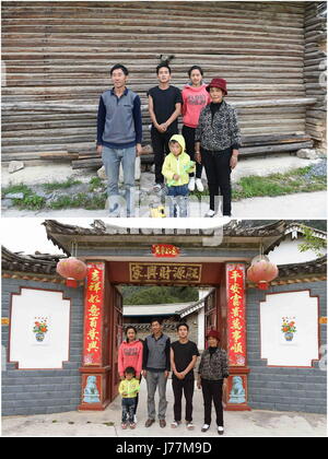 (170524) -- LANPING, 24 mai 2017 (Xinhua) -- associé photo prise le 22 mai 2017 montre Yang Yugui villageois et les membres de sa famille posent pour une photo dans leur ancienne et nouvelle maison dans Xiagaoping Village de Lanping Bai et Pumi comté autonome, le sud-ouest de la province chinoise du Yunnan. Pour aider à la lutte contre la pauvreté et d'augmenter les revenus des gens, le village avec une population de 147 personnes de l'ethnie Pumi développé culture et la sélection dans l'industrie ces dernières années. Certaines personnes ont aussi est sorti et est devenu les travailleurs migrants. L'installation de lampadaires solaires et des chauffe-eau, la reconstruction de routes et de logements et Banque D'Images