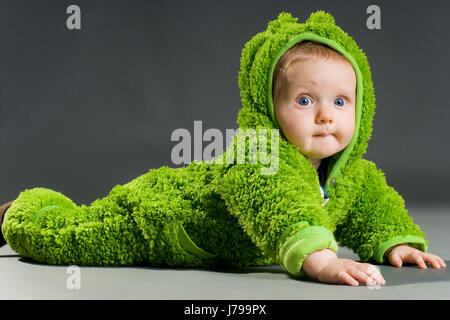 Bébé en costume de grenouille Banque D'Images