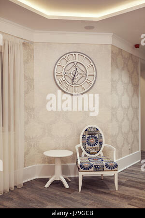 Intérieur d'un hôtel moderne et de nouveaux détails, de salle de réception, fauteuil et table en face d'un mur avec grosse horloge. Banque D'Images