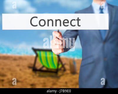 Se connecter - Business man showing signe. Le commerce, la technologie, internet concept. Stock Photo Banque D'Images