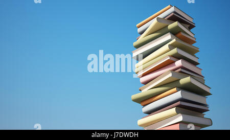 Pile de livres colorés avec clipping path isolé sur Sky Banque D'Images