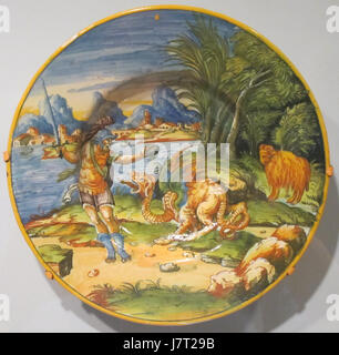 Une assiette en faïence émaillée d'étain représentant le mythe de Jason avec la Toison d'Or, située à Cincinnati, reflétant la mythologie grecque antique et la céramique traditionnelle Banque D'Images