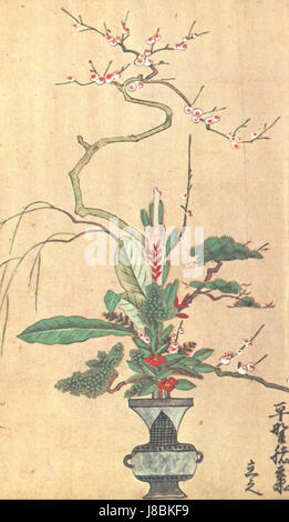 Ikebana Rikka est un style traditionnel japonais d'arrangement floral qui met l'accent sur l'utilisation d'éléments naturels, tels que les branches, les feuilles et les fleurs, disposés de manière harmonieuse et structurée. Banque D'Images