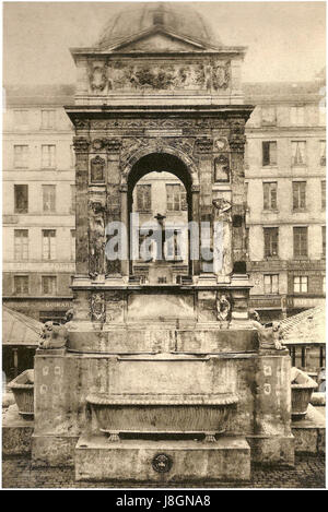La Fontaine des innocents, photographiée par Charles Marville en 1860, capture cette fontaine historique de Paris, mettant en valeur son architecture et son rôle de monument public. Banque D'Images