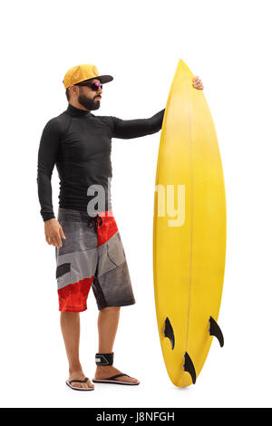 Portrait d'un surfer avec une planche isolé sur fond blanc Banque D'Images