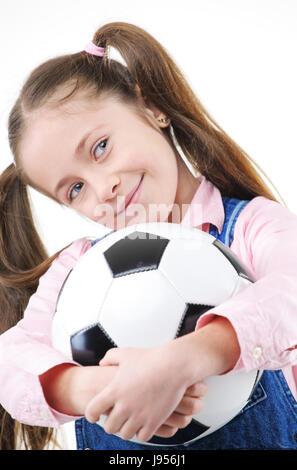 Cute little Girl with soccer ball on white background Banque D'Images