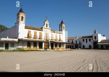 Les rues de sable et de fraternité maisons, El Rocio, Province de Huelva, Andalousie, Espagne, Europe Banque D'Images