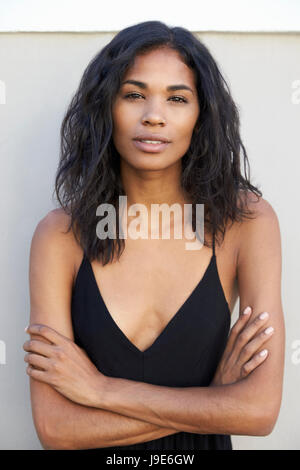 Portrait of young Latin American Woman with arms crossed Banque D'Images