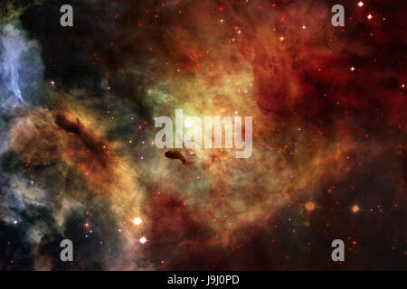 Nebula et les étoiles dans l'espace. Éléments de cette image fournie par la NASA. Banque D'Images