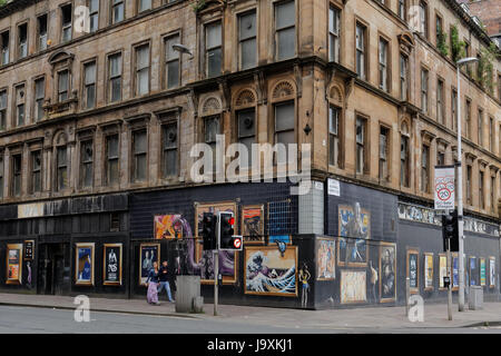 Glasgow art public commandé graffiti sur Argyle Street avec annonces om site de l'immeuble à démolir pour new hotel Banque D'Images