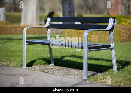 Banc dans un cimetière Banque D'Images