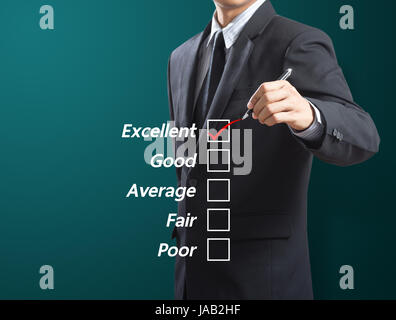 L'homme d'affaires contrôle de l'excellence Banque D'Images