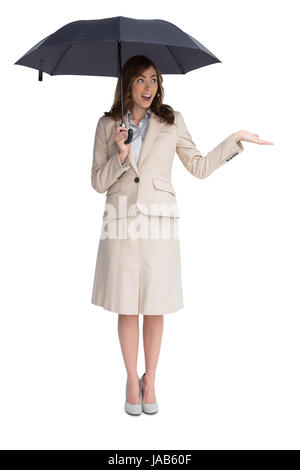 Elegant businesswoman holding glasses against white background Banque D'Images