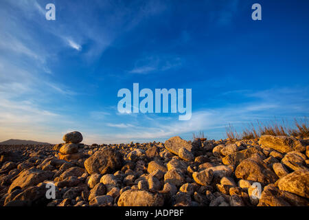 Ibiza Cap des Falco beach rolling stones en Sant Josep Îles Baléares Banque D'Images