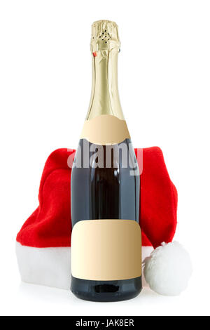 Bouteille de champagne et un chapeau de Père Noël sur le fond blanc Banque D'Images