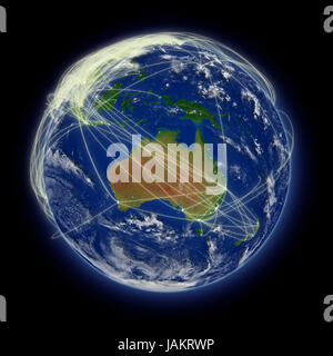 Réseau de chemins de vol sur l'Australie sur la planète Terre bleu isolé sur fond noir. Surface de la planète très détaillées. Éléments de cette image fournie par la NASA. Banque D'Images