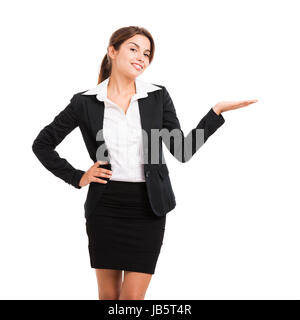 Beautiful hispanic business woman smiling over a white background et montrant quelque chose Banque D'Images
