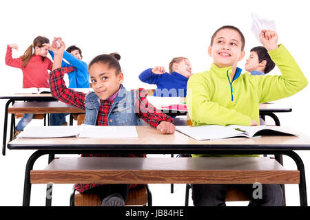 Le chaos dans la salle de classe pour les enfants Banque D'Images