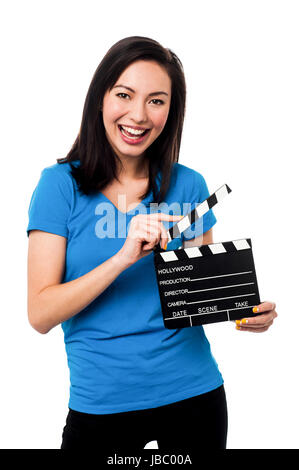 Cheerful asian young female holding cocoon over white Banque D'Images