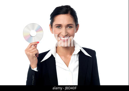 Dame en tailleur holding data dvd Banque D'Images