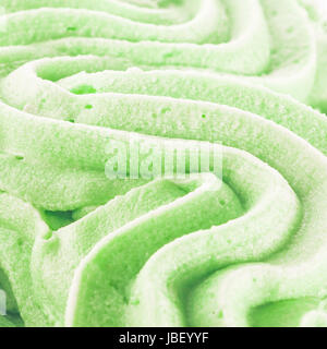 La texture de fond verte tourbillonnèrent rafraîchissante cool glaces italiennes pour un délicieux crémeux traiter d'été Banque D'Images