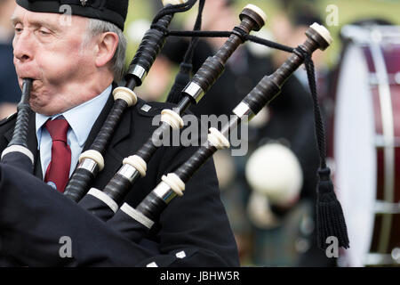 Glamis, Ecosse - Jun 11, 2017 : Pipers dans une fanfare à la Strathmore Highland Games événement tenu au château de Glamis, à l'Écosse. Credit : AC Images/Alamy Live News Banque D'Images