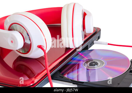 Casque rouge et ordinateur portable avec disque compact pour l'apprentissage du cours de langue Banque D'Images