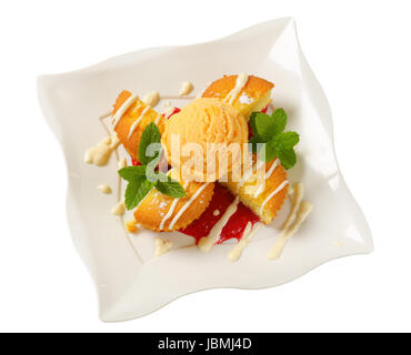 Rempli de crème anglaise muffins avec boule de glace Banque D'Images
