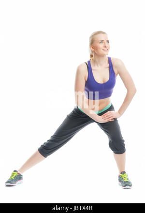 Fille blonde fait de la gymnastique Banque D'Images