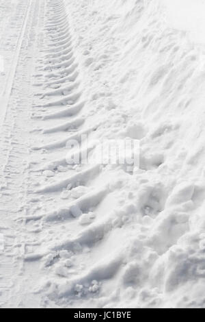 Molette dans la neige closeup Banque D'Images