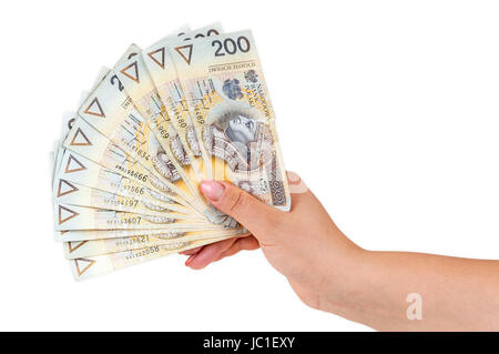 Main tenant 200 zloty polonais billets isolé sur fond blanc avec clipping path Banque D'Images