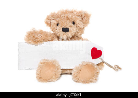 Ours en peluche avec un isolé avec panneau en bois pour une carte de vœux Banque D'Images