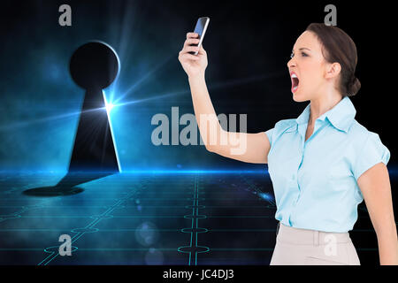 Image composite de angry classy businesswoman yelling at her smartphone Banque D'Images