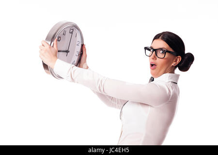 Woman holding a choqué l'horloge de bureau Banque D'Images