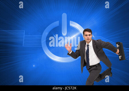 Image composite de stern attractive businessman dans un hury Banque D'Images