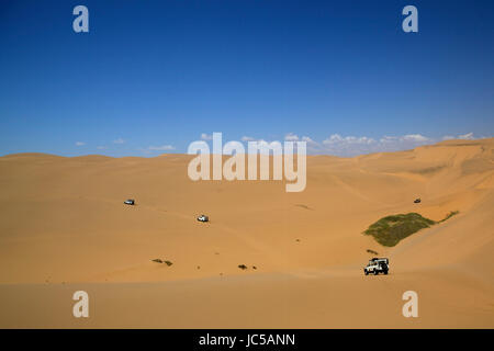 Équitation dunes africaines Banque D'Images