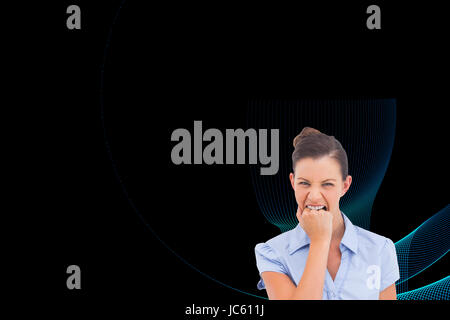 Composite image of businesswoman looking at the camera Banque D'Images