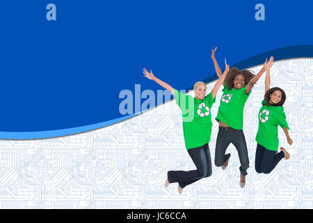 Image composite de trois militants de l'environnement et de saut smiling Banque D'Images