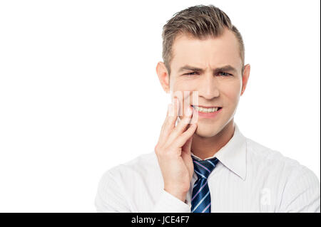 Jeune homme à l'agonie avec un mal de dents Banque D'Images