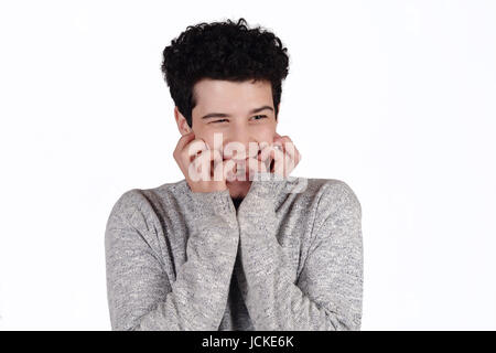 Portrait d'un jeune homme choqué. Isolé sur fond blanc. Banque D'Images